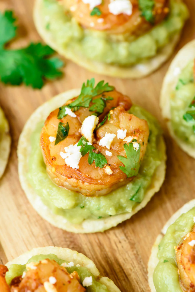 Spicy-Shrimp-Guacamole-Bites-Juicy-shrimp-and-spicy-guacamole-on-top-of-a-crunchy-toritlla-chip.-So-EASY-and-everyone-loves-this-appetizer-recipe